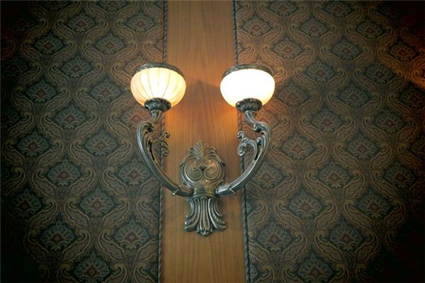 The meaning and symbol of Decorative light stand in dream