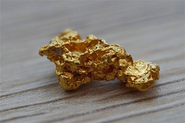 The meaning and symbol of Natural gold nuggets in dream