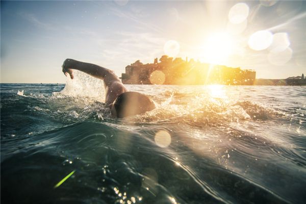 What is the meaning and symbol of swimming to the horizon in the dream?