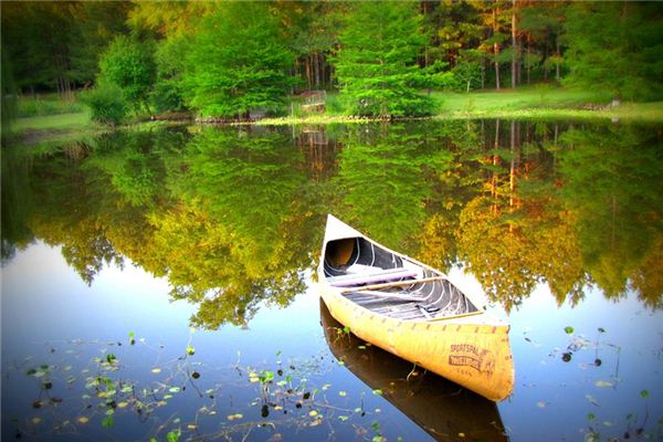 What is the meaning and symbol of boating in the dream?