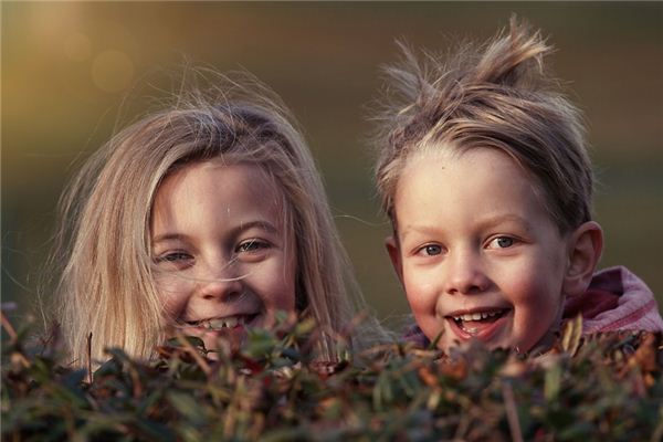 What is the meaning and symbol of laughing in a dream?