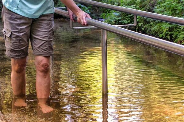 The meaning and symbol of barefoot crossing the shallow river in dreams