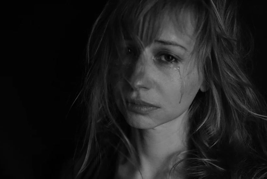 What does dreaming of crying symbolize?