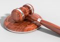 What does dreaming of litigation symbolize?