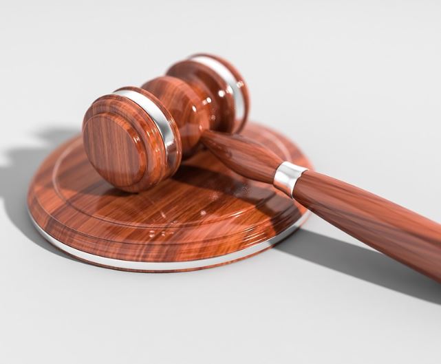 What does dreaming of litigation symbolize?